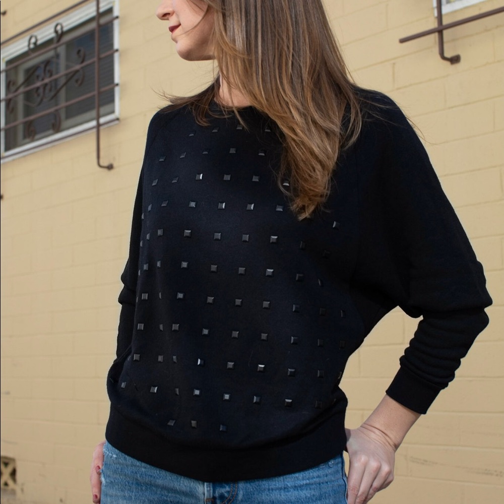 Levi’s black cropped, crew neck sweatshirt